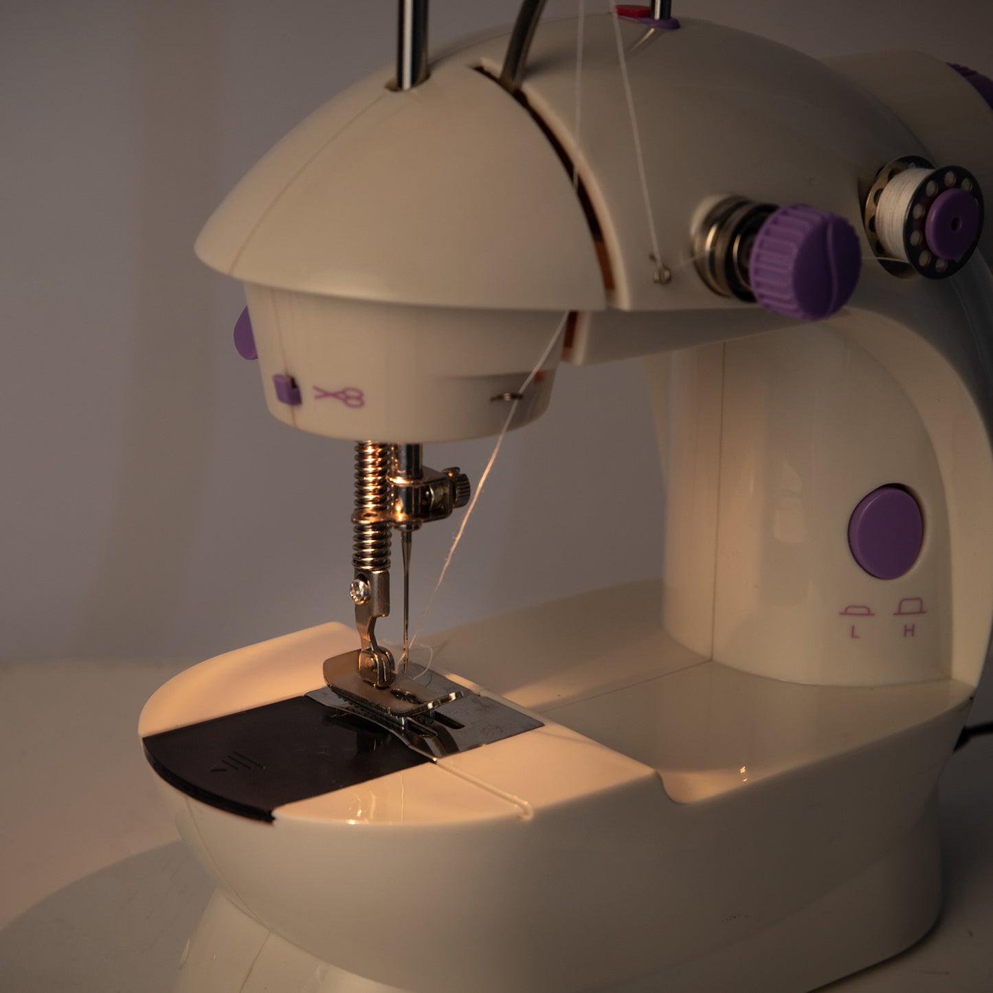 Compact Sewing Machine with Extension